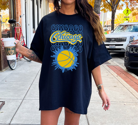 A black oversized Chicago Sky shirt featuring bold team graphics, offering a stylish and relaxed look for fans.